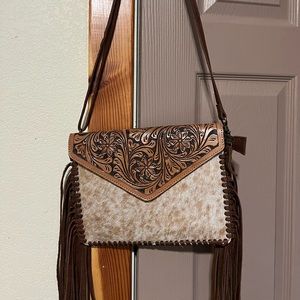 American Darling purse light tan/white with brown leather strap, fringe, & back